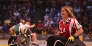people in wheelchair playing sports