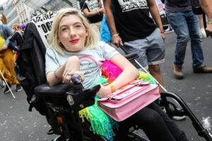 Pride woman using a wheelchair
